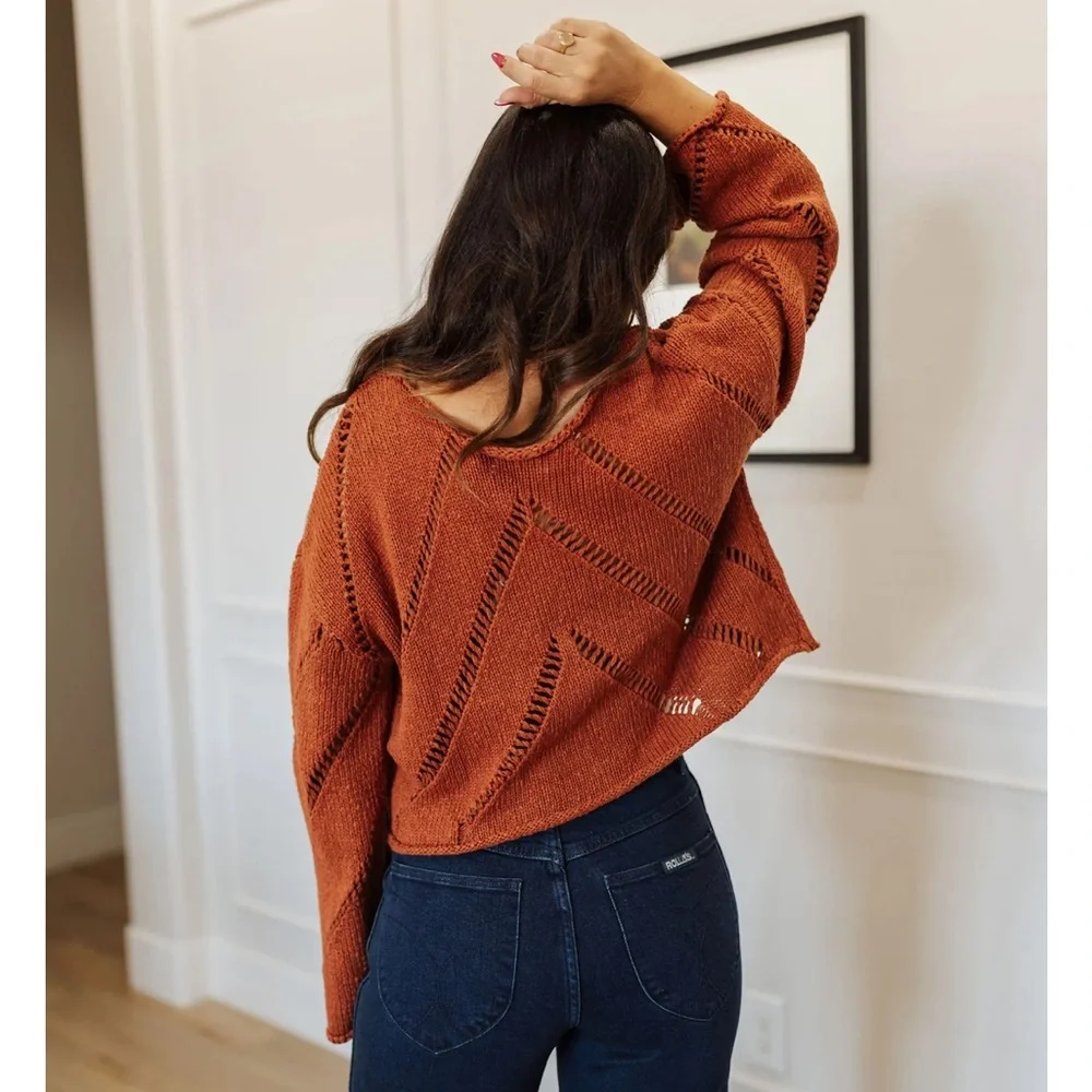 The orange Autumn Glaze Distressed‎ Sweater is Sz Medium